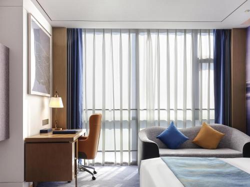 Habitación Ejecutiva con 1 cama king size, Acceso al Salón del hotel Novotel Changsha. Foto 1
