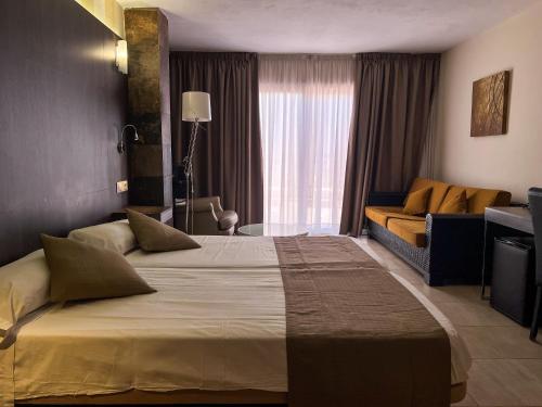 Habitación Deluxe del hotel La Aldea Suites. Foto 7