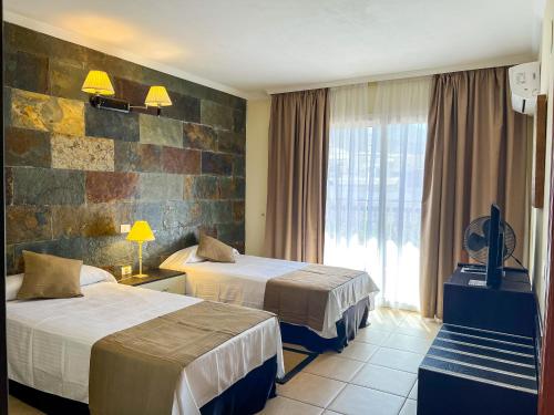 Suite Familiar del hotel La Aldea Suites. Foto 1