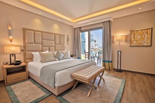 Suite Laguna Swim - up del hotel Rixos Premium Magawish Suites and Villas. Foto 6