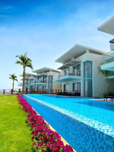 Suite Laguna Swim - up del hotel Rixos Premium Magawish Suites and Villas. Foto 7