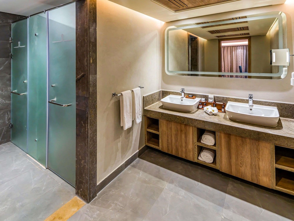 Suite Twin beds with Garden View del hotel Rixos Premium Magawish Suites and Villas. Foto 4