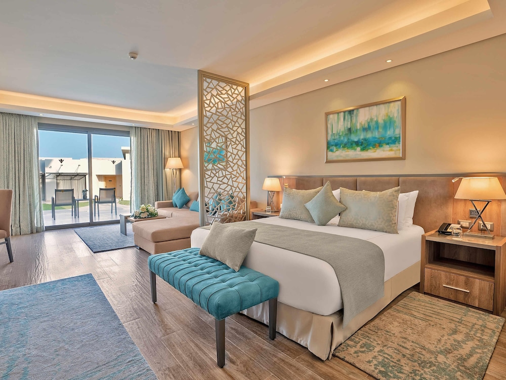 Suite Twin beds with Garden View del hotel Rixos Premium Magawish Suites and Villas. Foto 6