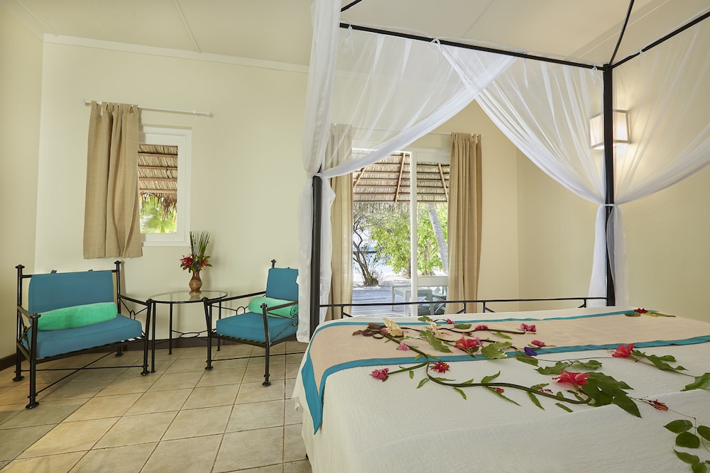 Bungalow de playa del hotel Kuredu Resort & Spa, Maldives