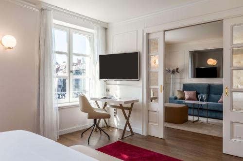 Suite Junior con vistas del hotel Nh Collection Brussels Grand Sablon. Foto 1