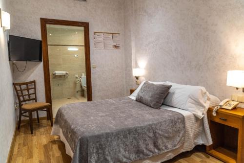 Habitación Doble Económica del hotel Granada Centro. Foto 2