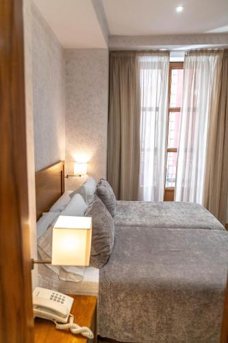 Habitación Doble Estándar - 2 camas del hotel Granada Centro. Foto 10