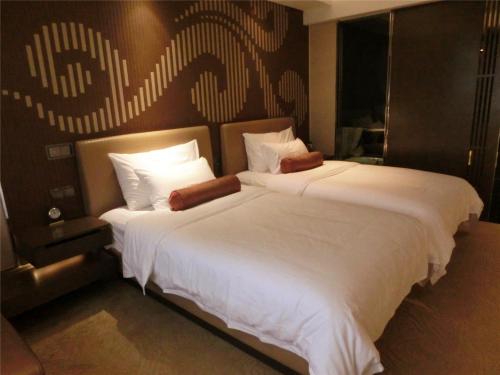 Habitación Doble Deluxe - 2 camas del hotel Baiyun Guangzhou. Foto 2