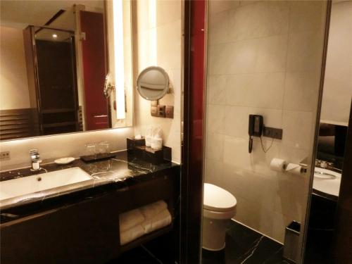 Habitación Doble Deluxe - 2 camas del hotel Baiyun Guangzhou. Foto 5