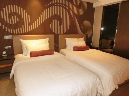 Habitación Doble Deluxe - 2 camas del hotel Baiyun Guangzhou. Foto 6