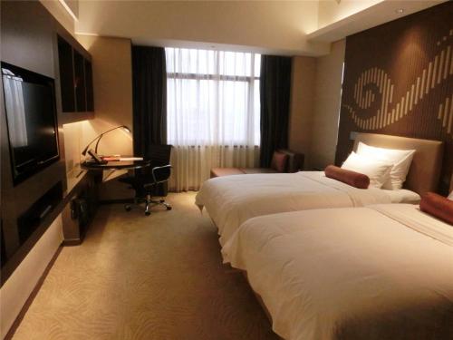 Habitación Doble Deluxe - 2 camas del hotel Baiyun Guangzhou. Foto 7