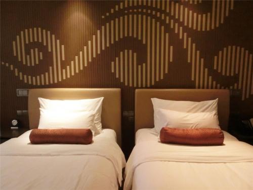 Habitación Doble Deluxe - 2 camas del hotel Baiyun Guangzhou. Foto 8