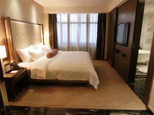 Suite Deluxe del hotel Baiyun Guangzhou. Foto 1