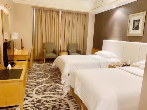 Habitación Business - 2 camas del hotel Baiyun Guangzhou. Foto 2