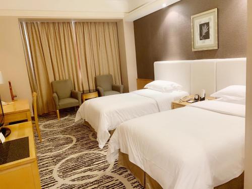 Habitación Business - 2 camas del hotel Baiyun Guangzhou. Foto 3