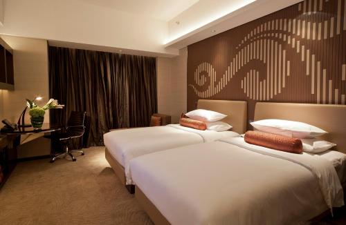 Habitación Doble Deluxe VIP - 2 camas del hotel Baiyun Guangzhou. Foto 1