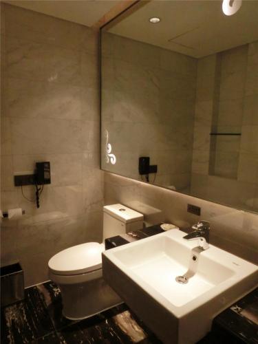 Habitación Doble Deluxe del hotel Baiyun Guangzhou. Foto 1