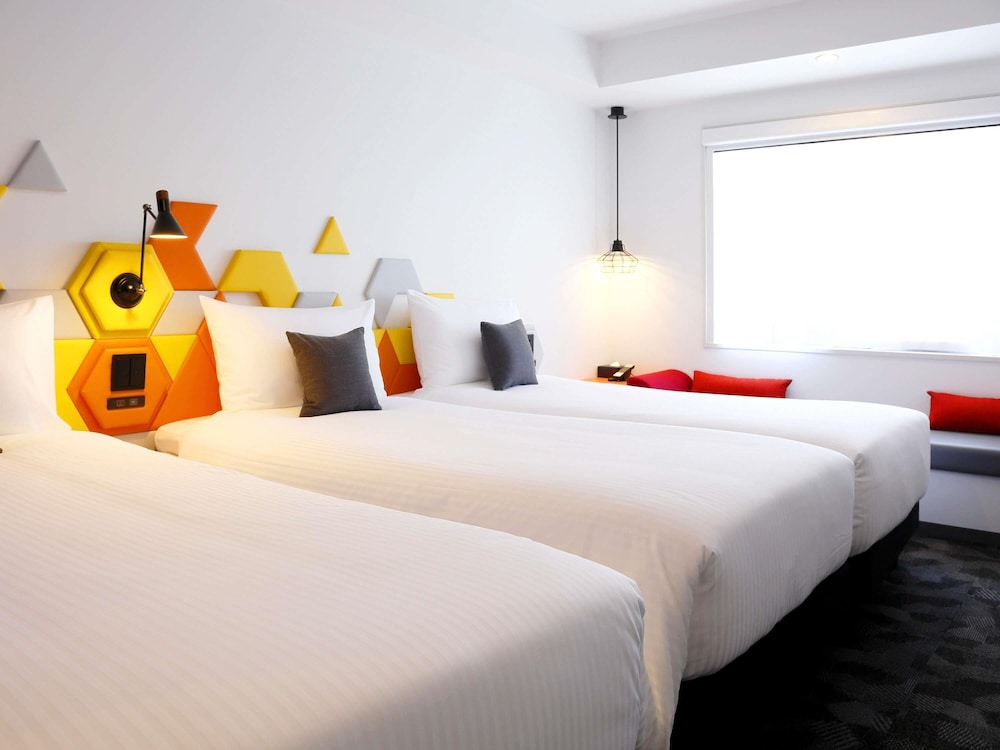 Habitación Superior con 3 camas individuales del hotel Ibis Styles Tokyo Bay