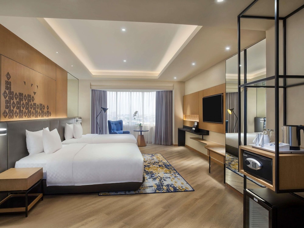 Habitación familiar, 2 camas de matrimonio del hotel Mercure Jakarta Batavia