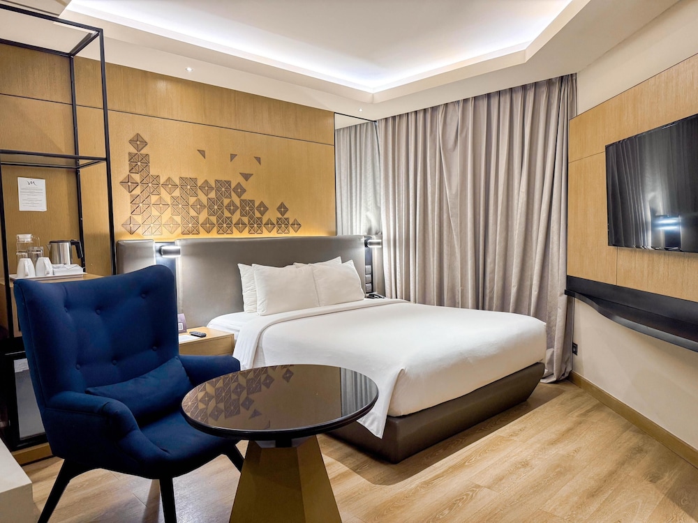 Habitación clásica, 1 cama de matrimonio del hotel Mercure Jakarta Batavia. Foto 1