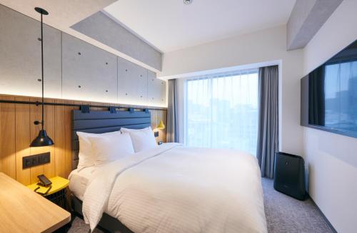 Habitación Doble Estándar - No fumadores del hotel Ibis Styles Nagoya. Foto 6