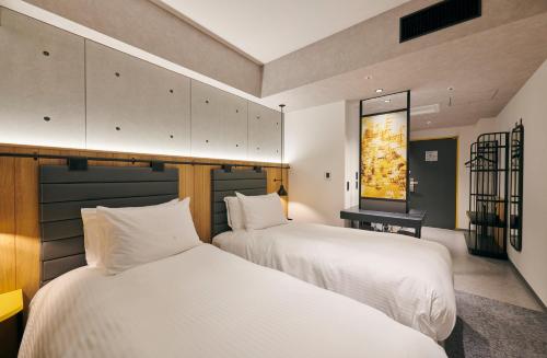 Habitación Doble Estándar - 2 camas - No fumadores del hotel Ibis Styles Nagoya. Foto 10