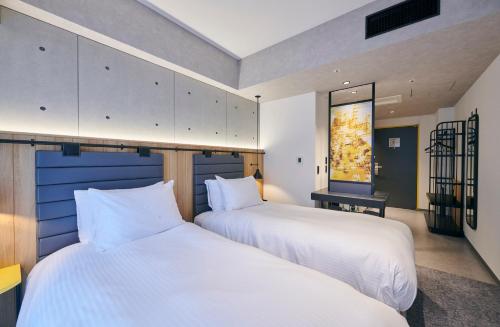 Habitación Doble Estándar - 2 camas - No fumadores del hotel Ibis Styles Nagoya. Foto 11