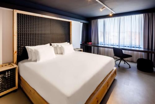 Habitación Atelier del hotel Nhow Brussels Bloom.. Foto 3