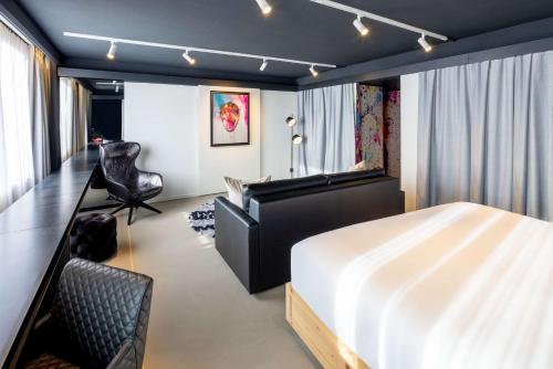 Suite Gallery con cama supletoria del hotel Nhow Brussels Bloom.. Foto 7