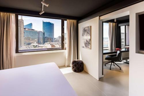 Suite Junior Art con cama supletoria del hotel Nhow Brussels Bloom.. Foto 3