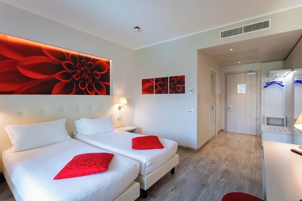Habitación con 2 camas individuales del hotel Ibis Styles Milano Est Settala