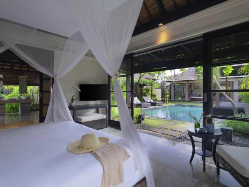 VILLA PRESIDENCIAL CON PISCINA DE 4 DORMITORIOS, 4 Camas Dobles, Piscina Privada del hotel Peppers Seminyak. Foto 1