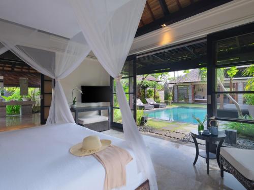 VILLA PRESIDENCIAL CON PISCINA DE 4 DORMITORIOS, 4 Camas Dobles, Piscina Privada del hotel Peppers Seminyak. Foto 6