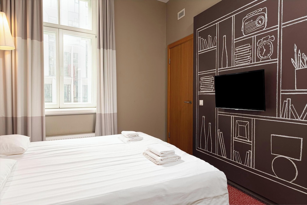 HABITACIÓN PREMIUM CON UNA CAMA DOBLE Y ESPACIO EXTRA del hotel Ibis Riga Centre. Foto 2