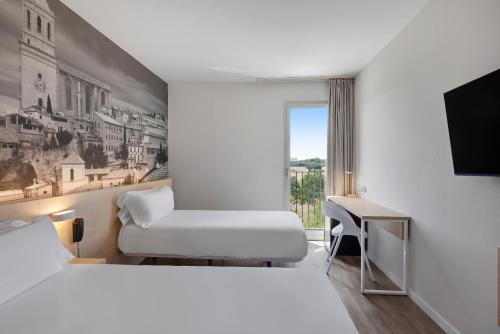 Habitación Triple del hotel B&B Girona 3