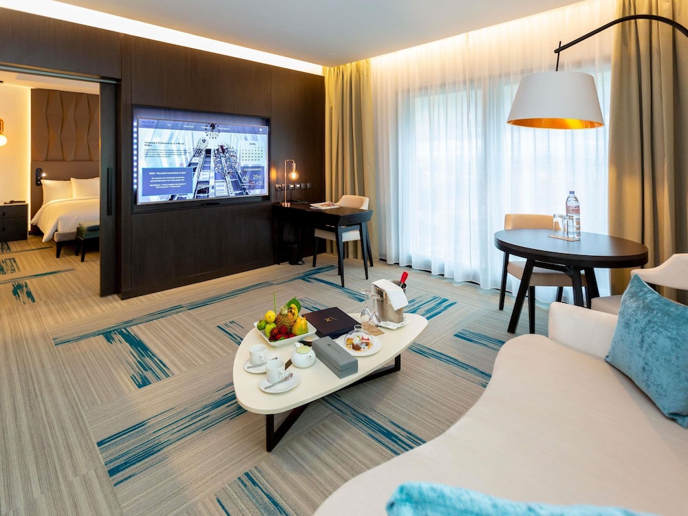 SUITE JUNIOR con 1 cama king size del hotel Novotel Convention y Spa Antananarivo. Foto 11