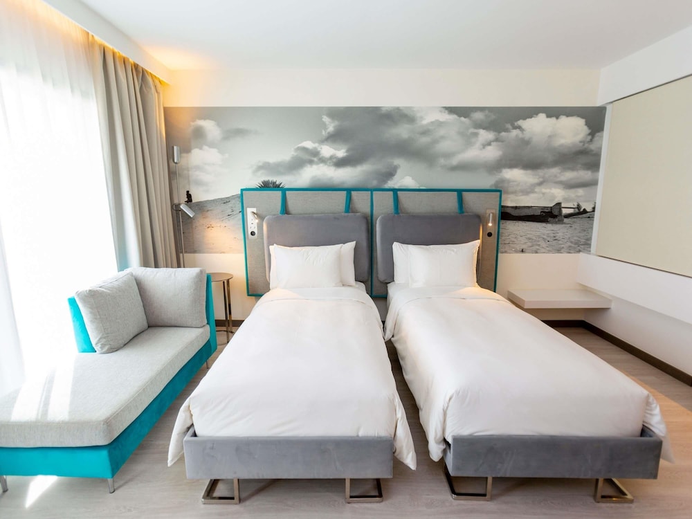 Habitación superior con 2 camas individuales del hotel Novotel Convention y Spa Antananarivo. Foto 6