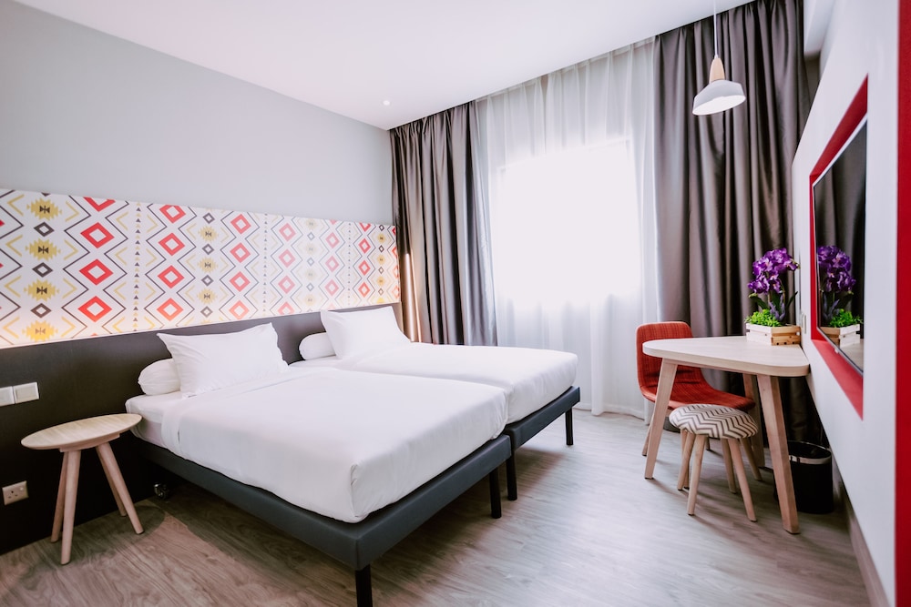 Habitación superior con 2 camas individuales del hotel Ibis Styles Kota Bharu