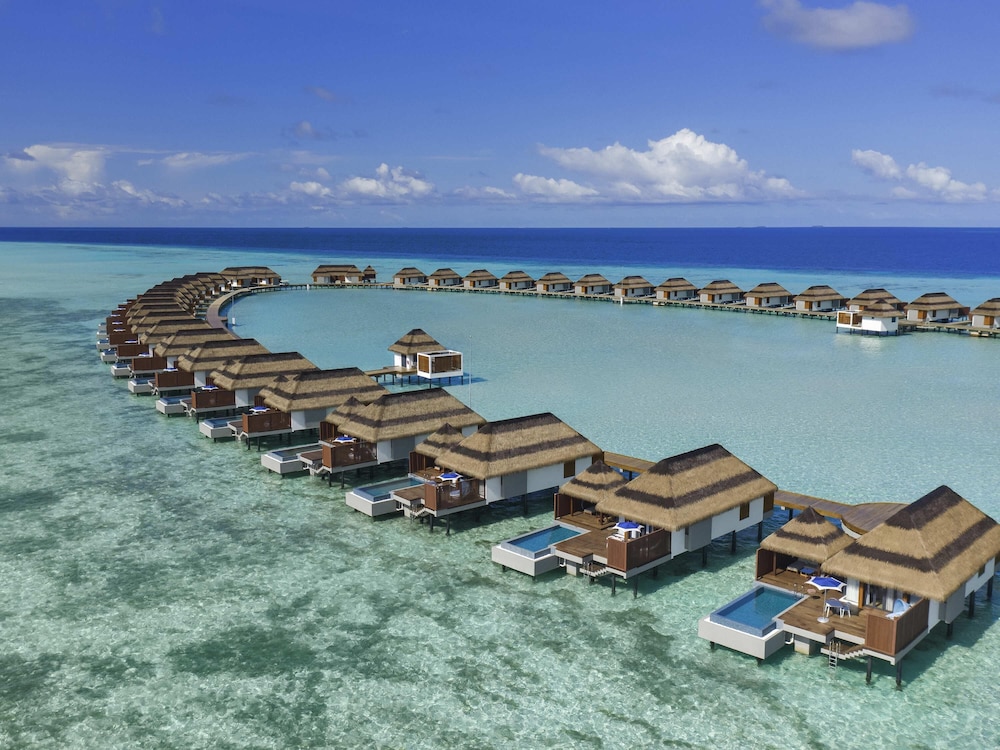 Villa con Piscina y Vistas al Océano al Atardecer del hotel Pullman Maldives All-Inclusive Resort