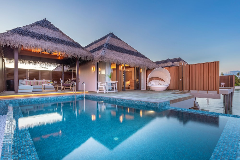 Villa con Piscina y Vistas al Océano al Atardecer del hotel Pullman Maldives All-Inclusive Resort. Foto 6