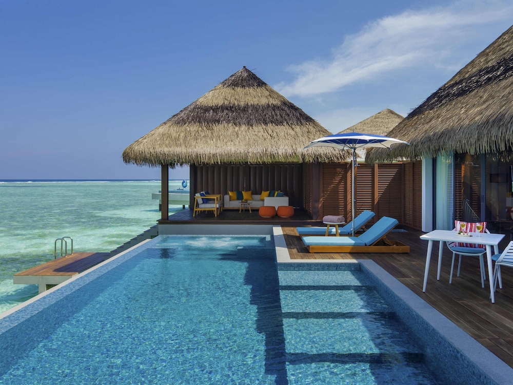 Suite Vista Mar Balcón o Terraza piscina del hotel Pullman Maldives All-Inclusive Resort. Foto 4