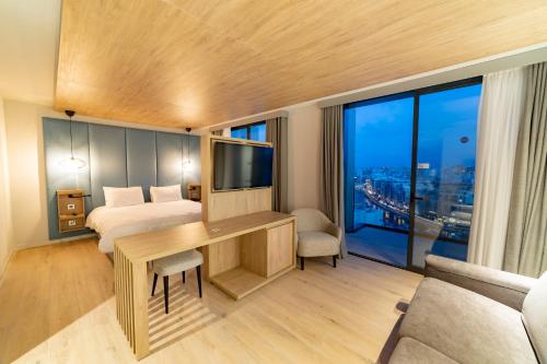 Suite Junior Privilege con vistas al mar del hotel Mercure St. Julian's Malta. Foto 6