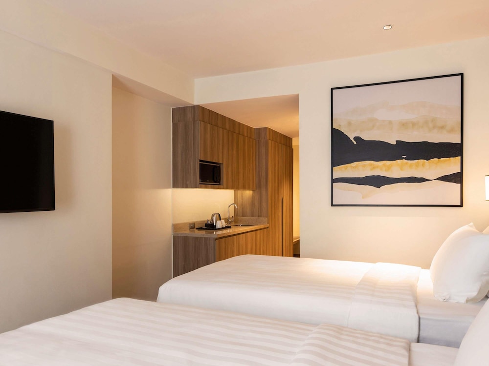 Estándar con Vistas al Río, Dos Camas del hotel Novotel Suites Manila At Acqua. Foto 1