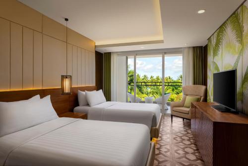 Habitación Doble Superior - 2 camas del hotel Mövenpick Resort and Spa Boracay. Foto 1