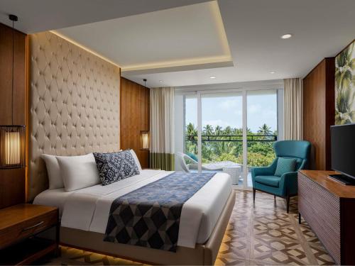 Suite Premium - Cama extragrande del hotel Mövenpick Resort and Spa Boracay