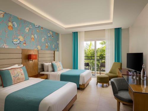 Habitación Doble Clásica - 2 camas del hotel Mövenpick Resort and Spa Boracay. Foto 1