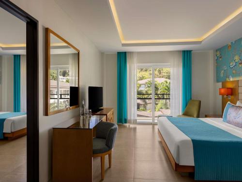 Habitación Familiar del hotel Mövenpick Resort and Spa Boracay. Foto 2