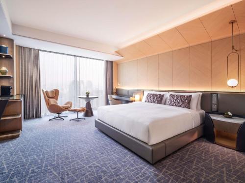 Habitación Fairmont con cama extragrande del hotel Fairmont Ambassador Seoul. Foto 3