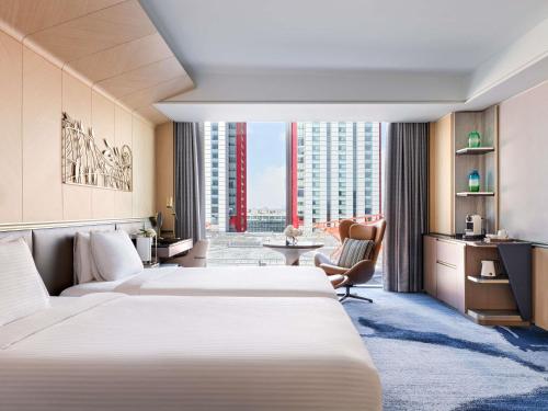 Habitación Doble Deluxe con vistas panorámicas - 2 camas del hotel Fairmont Ambassador Seoul. Foto 2
