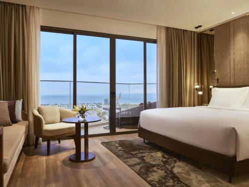 Two - Bedroom Family Studio with Sea View del hotel Mövenpick Villas and Residences Phu Quoc. Foto 1